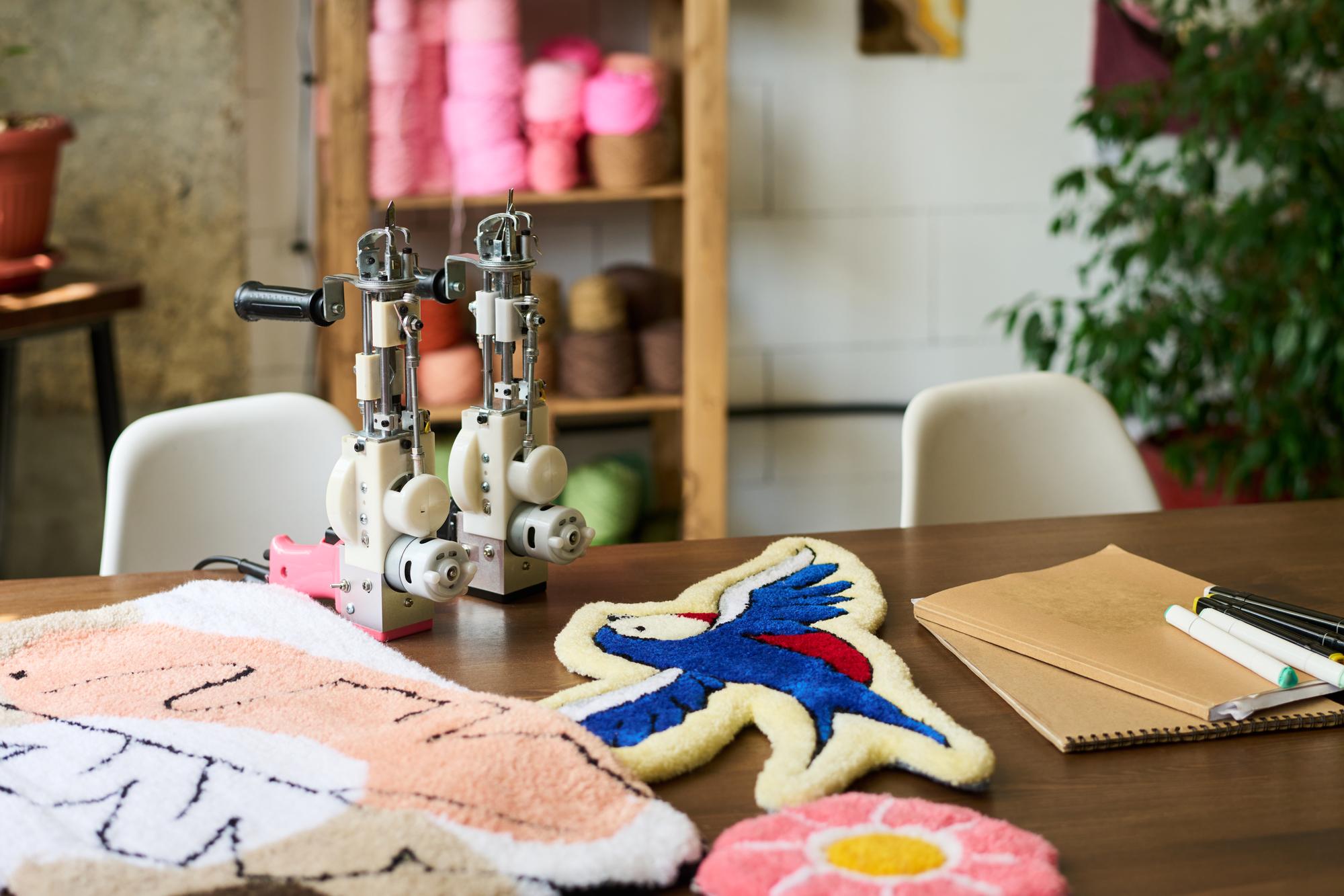 studio interior with embroidery tools and samples